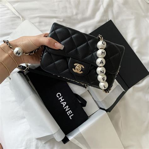 chanel pearl bag fake|chanel bag with pearl chain.